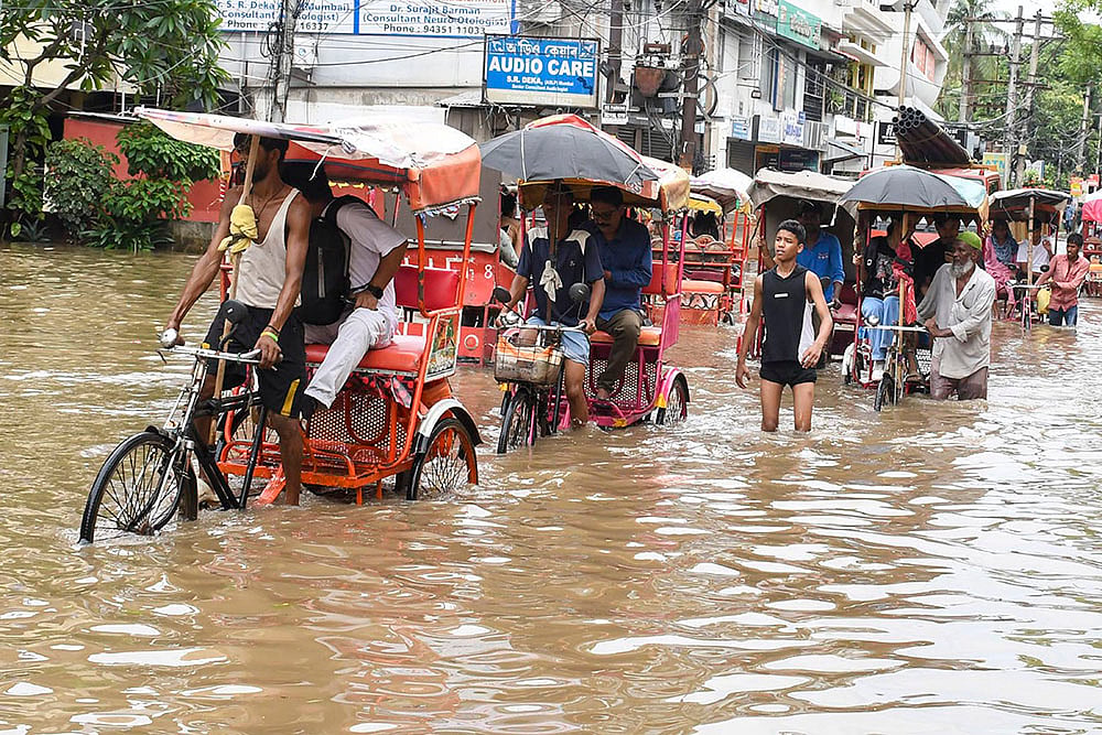 Flooded street in Guwahati - | Photo: PTI